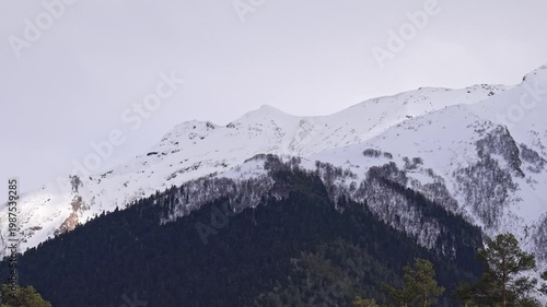 Snow-capped mountain peaks. A magnificent natural landscape.