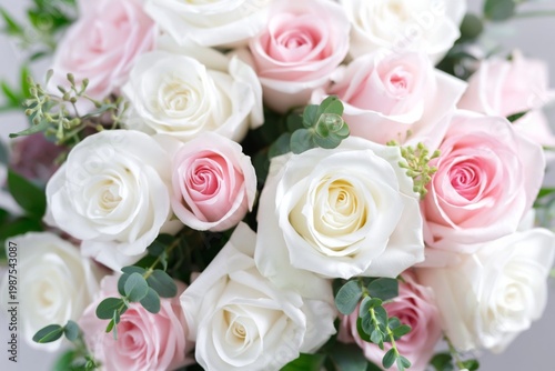Flowers in a Bouquet With White and Pink Roses Arranged Together in a Simple Design