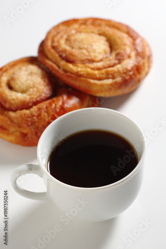 Black coffee and cinnamon rolls