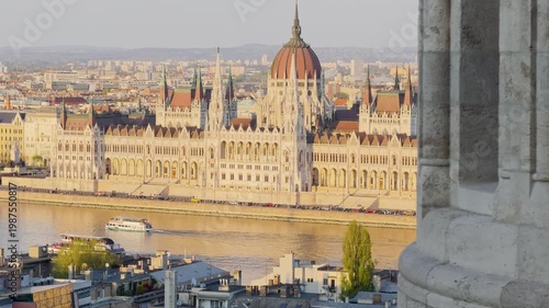 Aerial 4K video footage of Hungarian Parliament Building, Parliament of Budapest. Aerial drone view of Budapest architecture, stunning historic building. Sunset and golden hour