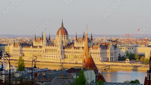 Aerial 4K video footage of Hungarian Parliament Building, Parliament of Budapest. Aerial drone view of Budapest architecture, stunning historic building. Sunset and golden hour