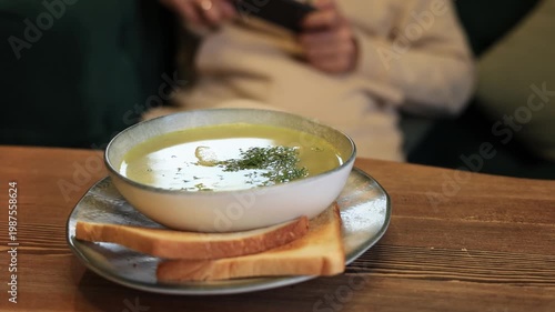 A bowl of fresh noodle soup at a cafe.