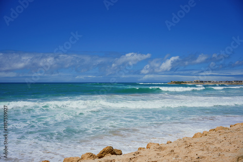 Dakhla beach with blue sky and clouds