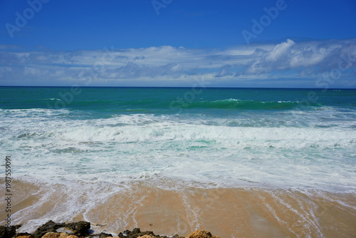 Dakhla beach with blue sky and clouds