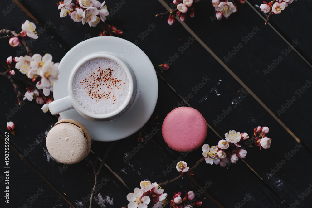 custom made wallpaper toronto digitalCup of hot  coffee with macaroon cookies and spring flowerson the old rustic black wooden tabletop.