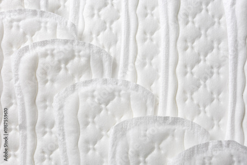 Сlose-up of feminine hygiene pads. The concept of simple care and  beauty minimalism. Selective focus and space for text