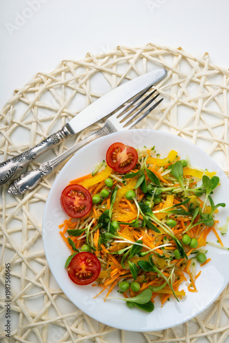 Wallpaper Mural Healthy veggie salad with apple, green herbs, bell paper, seeds and carrots - low carbohydrate, low calorie diet. Healthy eating, nutrition and diet concept. Top view, flat lay Torontodigital.ca