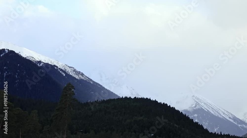 Snow-capped mountain peaks. A magnificent natural landscape.