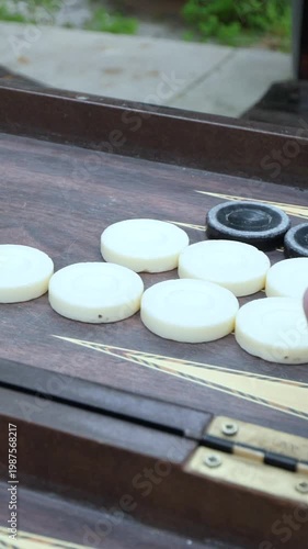 Playing Backgammon in Vertical Format – Dice Rolling and Hands Close-Up 4K