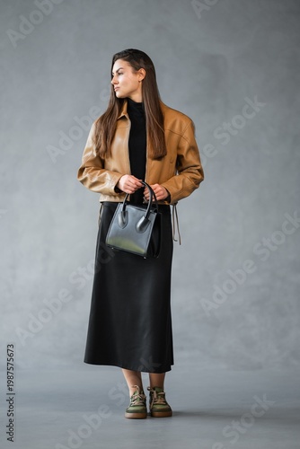 Wallpaper Mural Stylish City Woman Carrying Bag. Citydwelling Woman With Contemporary Style And Functional Accessories Torontodigital.ca