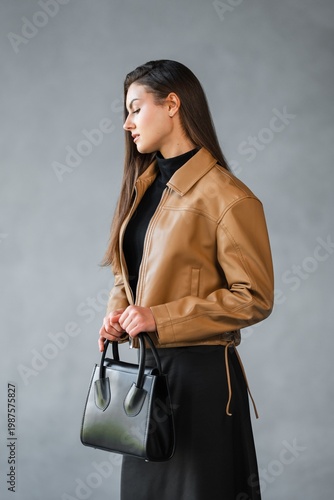 Wallpaper Mural Caucasian Woman Catalog Model Inspecting Black Handbag, Midshot Focusing On Clasp And Silhouette, Calm Torontodigital.ca