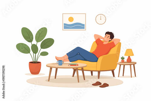 Young caucasian male relaxing on armchair in cozy living room setting