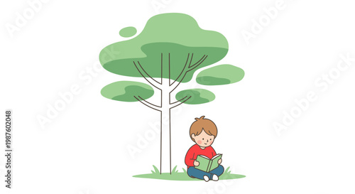 Boy sitting under a tree reading.