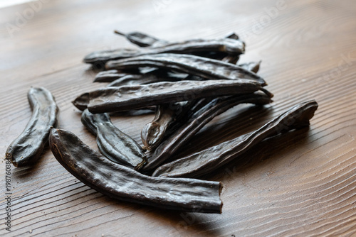 Close-up of Dried Carob Pods on Table