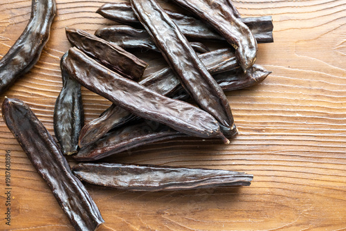 Close-up of Dried Carob Pods on Table