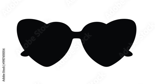 Black heart shaped sunglasses presented as a striking graphic silhouette