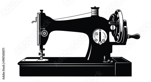 Vintage sewing machine in a striking black silhouette
