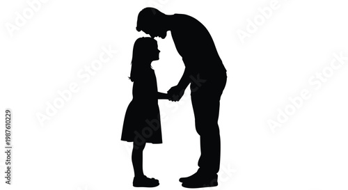 A father and daughter share a tender moment a dark silhouette
