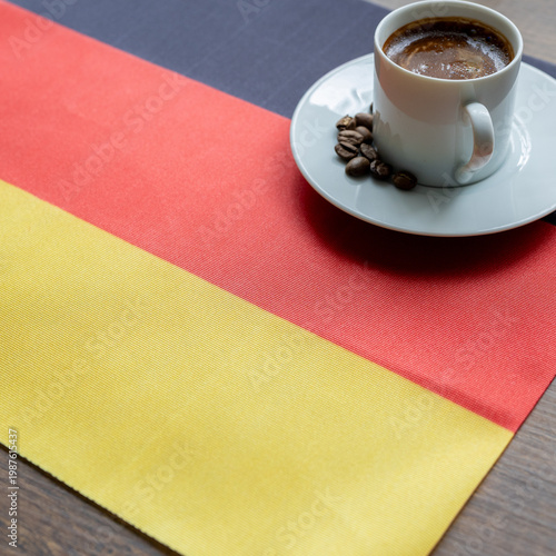 Close-up of Coffee Cup on German Flag