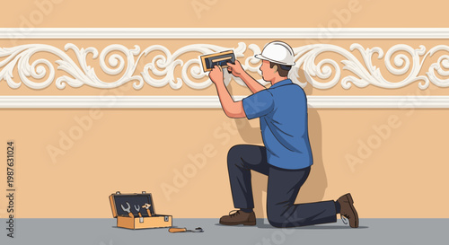 Worker in hard hat polishing ornate decorative plaster molding on wall