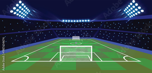 Nighttime view of a professional soccer stadium. Bright floodlights illuminate the green grass field with white markings. Goals are positioned on each end, and a soccer ball rests near center field