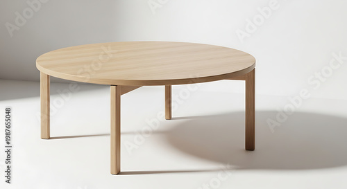 A minimalist Scandinavian round table made of light oak wood with a matte finish.