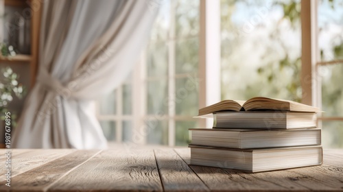 窓辺の木製テーブルに置かれた本