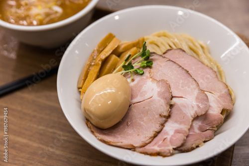 Delicious ramen and dipping broth with pork meat