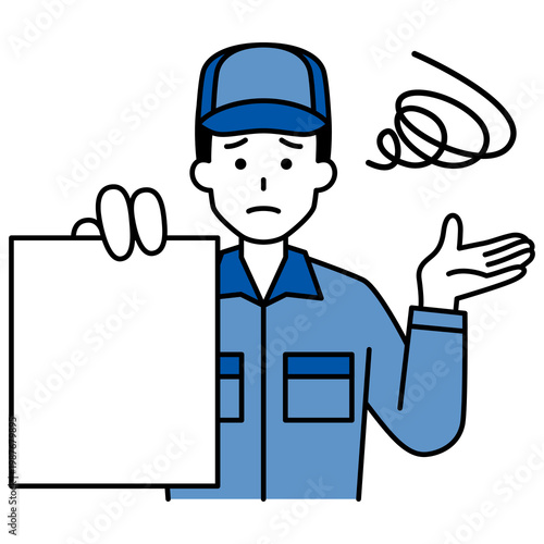 書類を見せて困るつなぎ作業服の男性