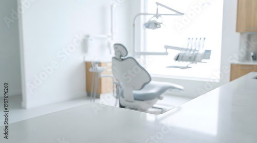 A modern dental chair sits in a clean, white dentist's office with a dental background, featuring a large window with natural light