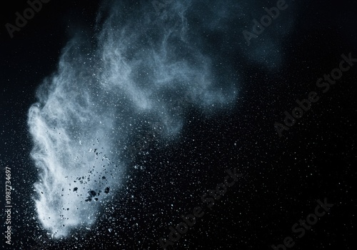 White frost particles drifting through dark blue space over grainy texture for winter background concept with copy space for seasonal advertising or creative overlay