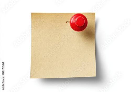 A blank, square, tan sticky note is attached to a surface by a red pushpin