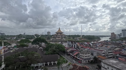 View of Kuching Waterfront area along with Sarawak River and green forest. It offers a stunning panorama that blends historic charm with natural beauty