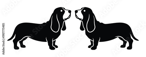 Basset Hound dog silhouettes, black and white canine vector graphics, symmetrical hunting dog profile icons for pet branding and logo design