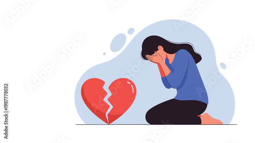 Sad woman kneeling on the ground crying in despair next to a large broken red heart symbol of loss and heartbreak.