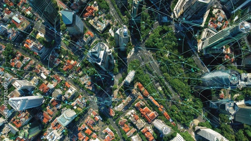 Aerial view of a bustling cityscape with green spaces and digital connectivity overlay
