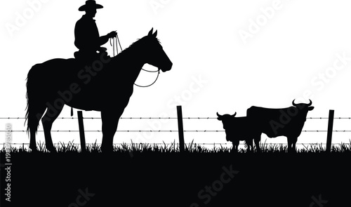 Black silhouette of cowboy on horse and two cows behind barbed wire fence