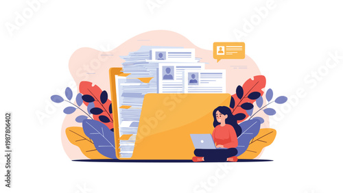 Young woman sits with a laptop in front of an oversized file folder containing many resumes as part of a recruitment and hiring process.
