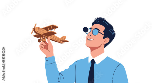 Man in a blue shirt wears binoculars while holding a wooden model airplane representing vision and travel industry concepts.