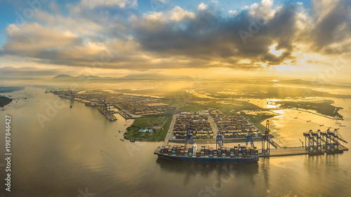 Obraz na płótnie Aerial top down view of a large container cargo ship in motion over open ocean B