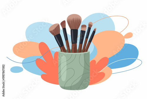 Set of Makeup Brushes in a Holder with Abstract Shapes.