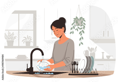 Young woman washing dishes in kitchen sink