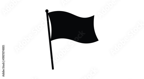A simple black flag waving in the breeze a stark silhouette