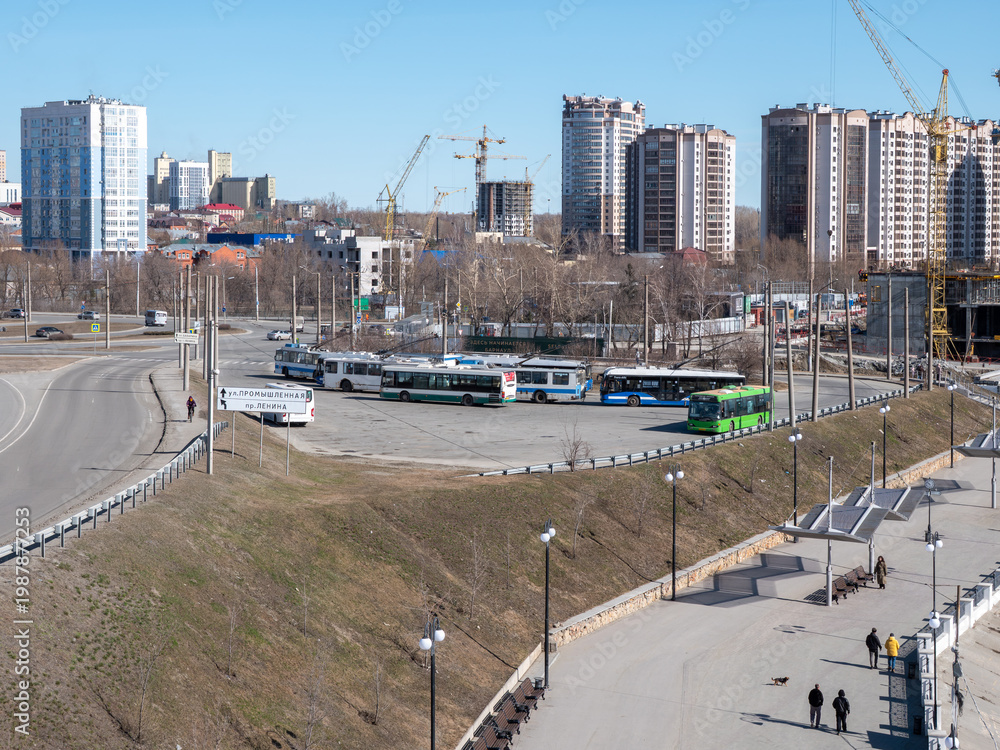 Ταπετσαρία April 09 2026 Barnaul Russia final stop at River Station with trolleybuses spring cityscape urban transport infrastructure and clear weather