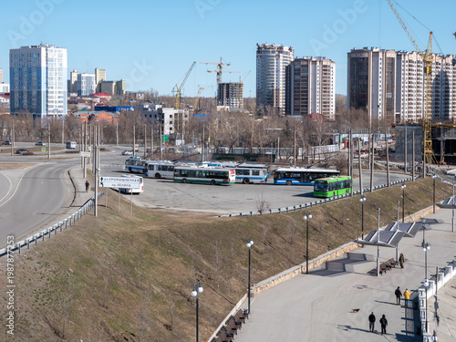 Fotografie April 09 2026 Barnaul Russia final stop at River Station with trolleybuses spring cityscape urban transport infrastructure and clear weather