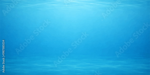 Clear blue water surface with ripples reflecting sunlight and sky clouds creates an abstract liquid texture of a deep summer ocean wave
