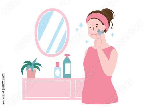 フェイスローラーを使う女性