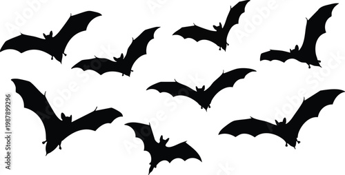 Flying bats group isolated on white background. Black night bat silhouettes