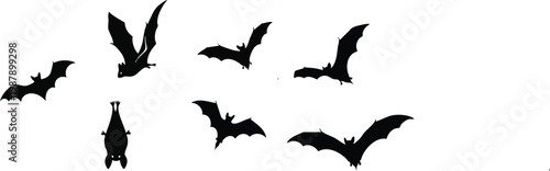 Flying bats group isolated on white background. Black night bat silhouettes