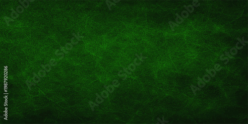 Abstract green grunge background featuring a vintage textured canvas pattern with aged paper material and a rough dirty wall design for a retro backdrop